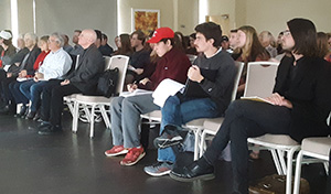 crowd listening to Fr. Columba