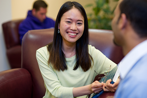 A student smiles at the camera during a TESOL class at Saint Michael's College.