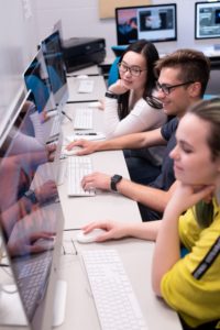 Students researching in the computer lab