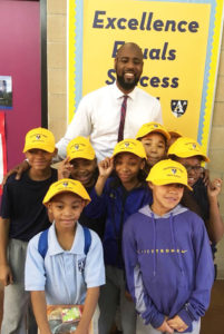 Adam with kids in hats