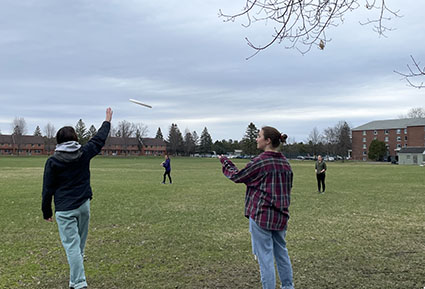 Throwing Frisbee