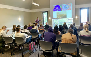 To a full house, lecturer Ryan Shea suggests how poetry can help us read the book of nature
