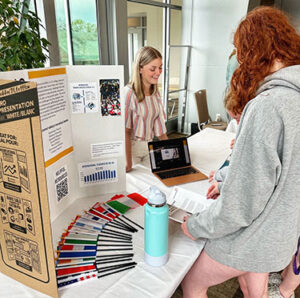 Posters, departmental presentations impress visitors with student achievement
