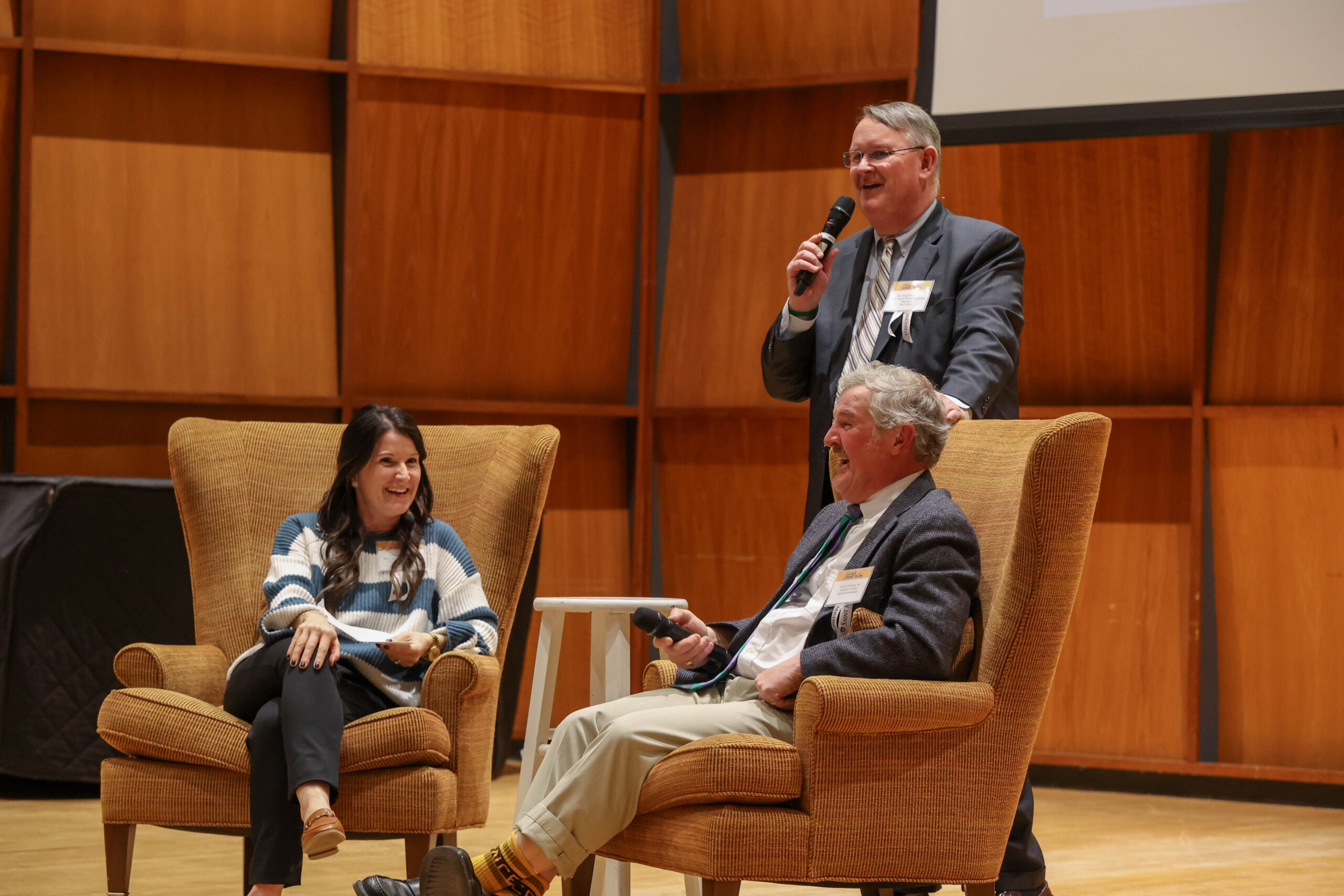 Patrick Fitzgibbons '89 introduces Keynote Speaker Daniel Sullivan '87 and Moderator Jillian Charest '04.