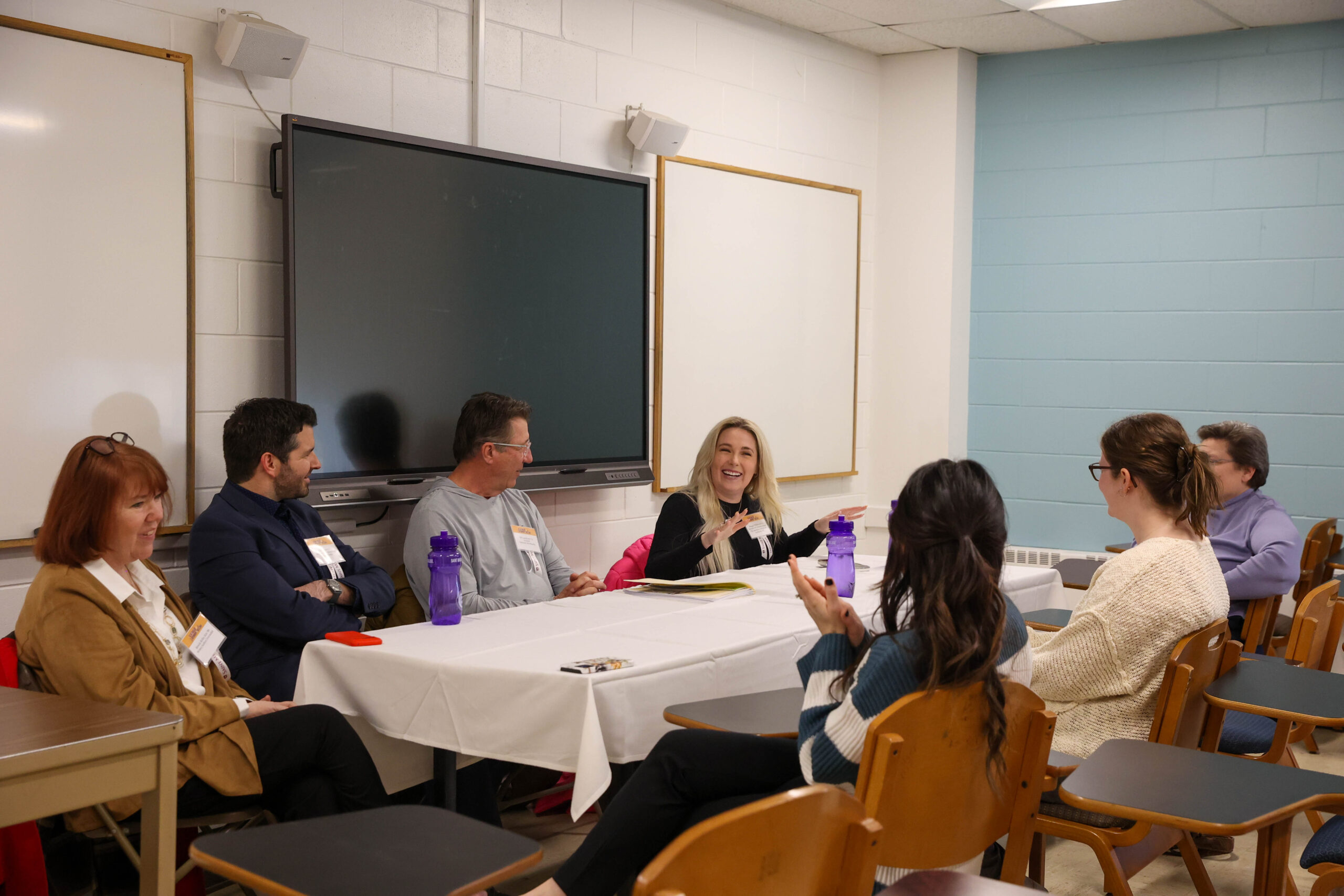 Alumna Maggie Whittemore '17 enjoys chatting with students at the 