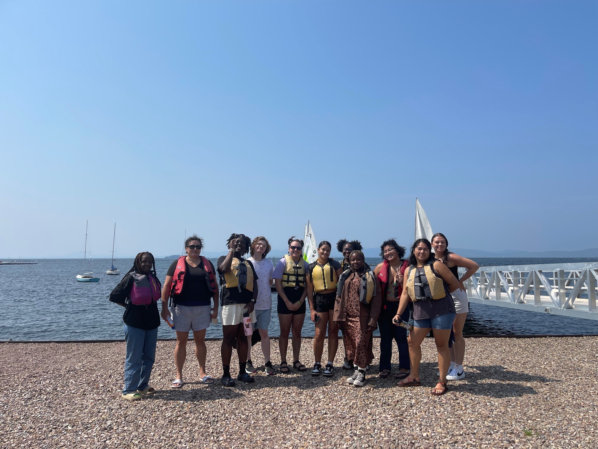Saint Michael's College students pose near Lake Champlain during SOAR.