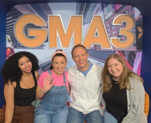Ashley DeLeon '23 (left) with the cast and crew of Ms. Rachel during an interview with Good Morning America.
