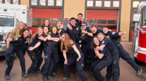 Students on Saint Michael's Rescue pose together for a goofy photo. 