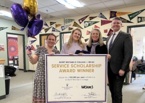Enosburg High School senior Ava Walker (second from left) is a recipient of the Saint Michael’s College & WCAX Service Scholarship. Also pictured (from left) are Brenna Sturtevant, Enosburg High School Counselor and Saint Michael’s College alumni; Michelle Jordan, Saint Michael’s College Director of Marketing; and Jay Barton, WCAX General Manager from March 2026.