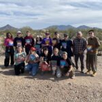 Group photo of students on academic study trip to southern U.S. border.